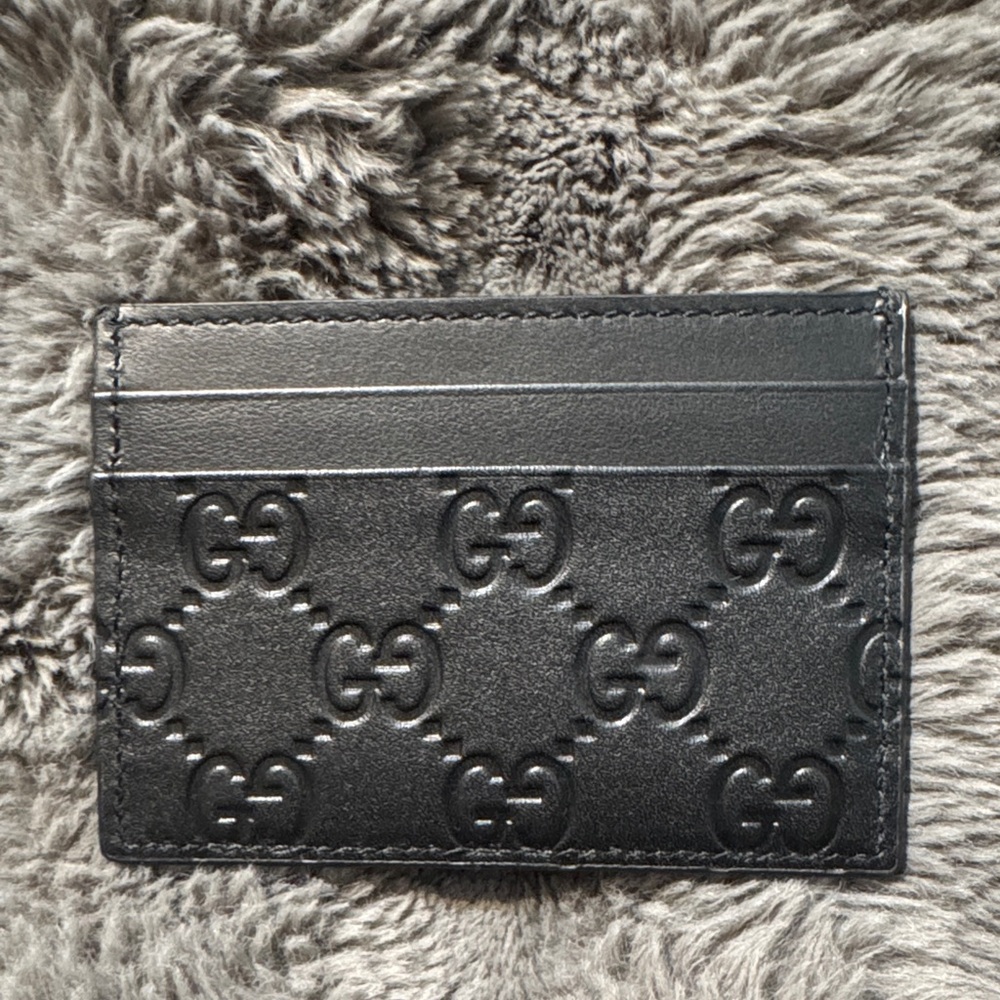Gucci Black GG Embossed Leather Card Case